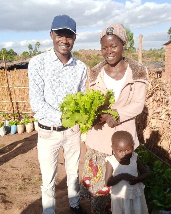 A subsistence farmer ready to deliver his lettuce